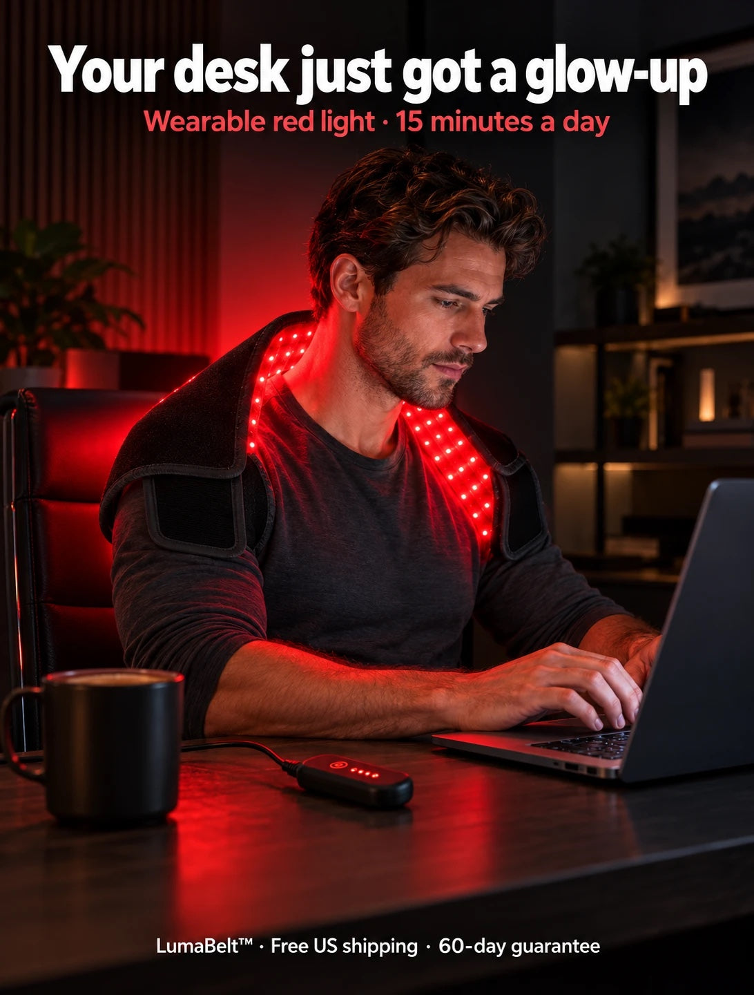 Man wearing LumaBelt over his shoulders while working at his desk